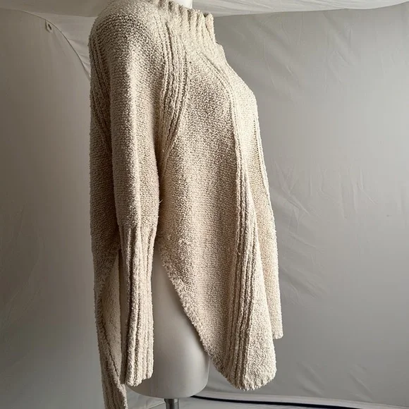 Free People Spin Around Poncho Top in an off-white cream color - Picture 3 of 10